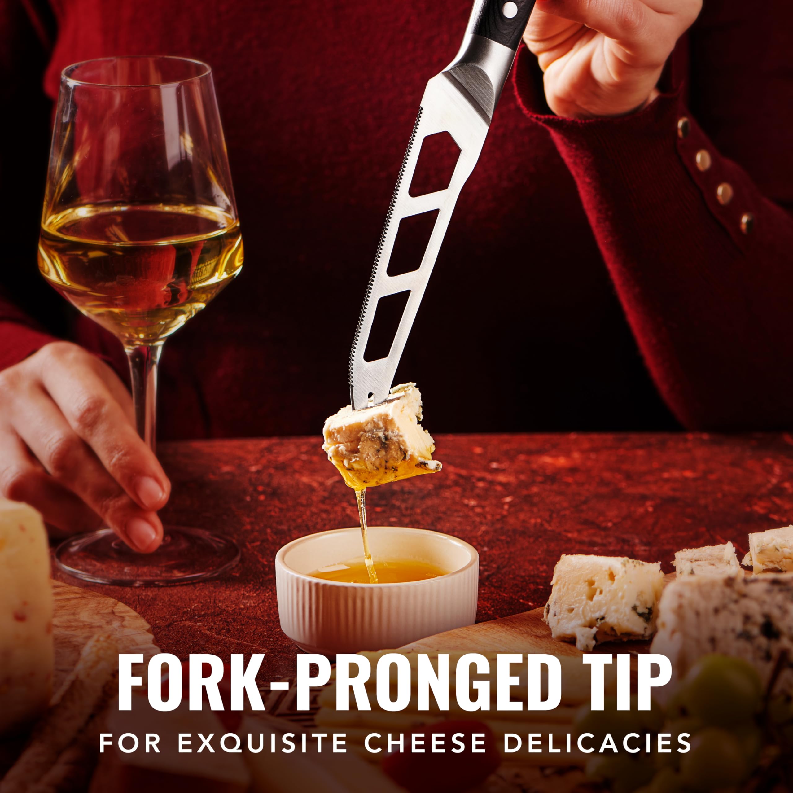 Cutluxe cheese knife with pronged tip lifts slices effortlessly