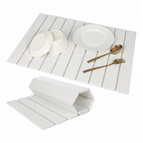 CYROXIS Stone Drying Mat on the counter shows quick-dry efficiency.