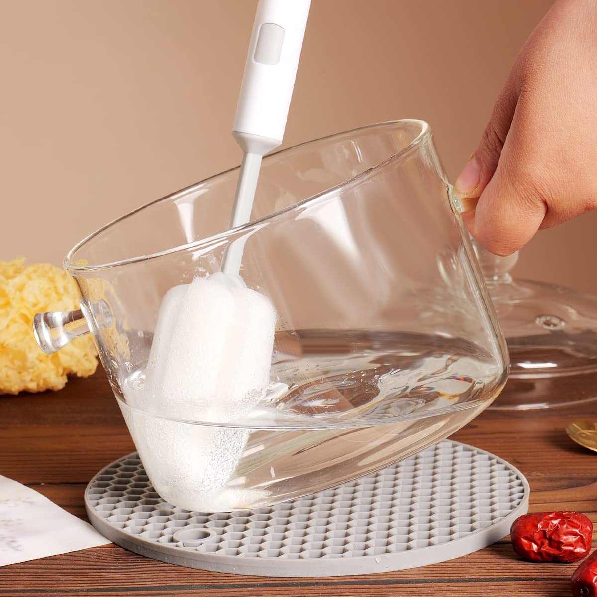 CZSZYGHBAO kitchen scene featuring clear glass pot on stovetop.