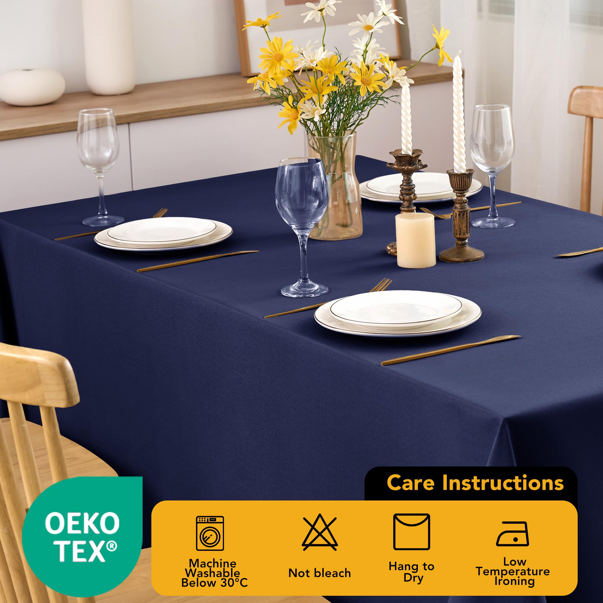 Dailyset navy tablecloth paired with silverware creates upscale wedding ambiance.