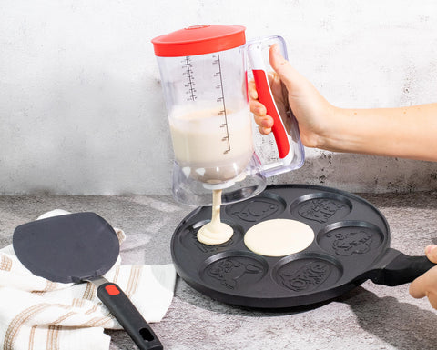 Dalup dispenser in a kitchen prep scene for waffles, crepes, and muffins.
