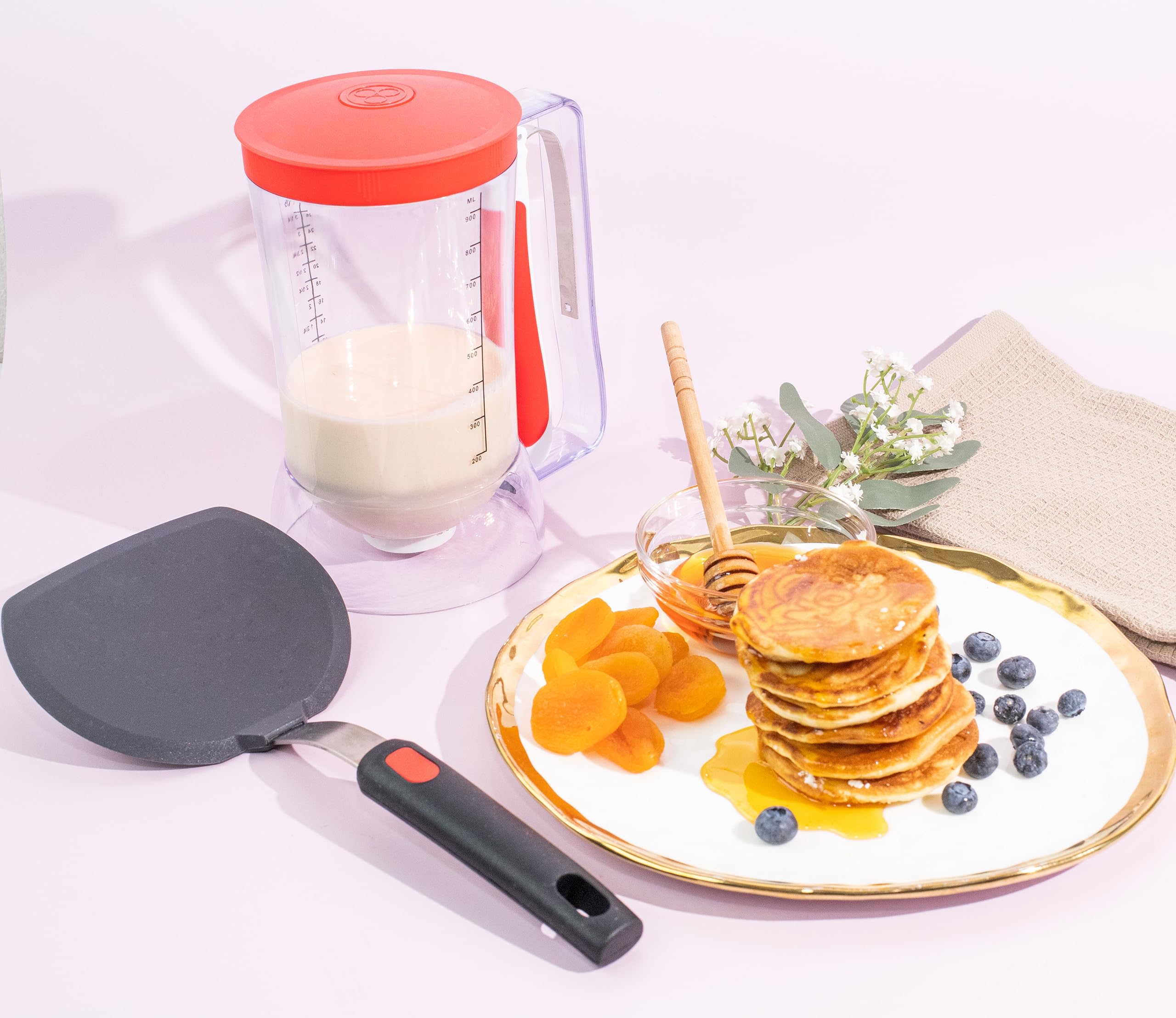 Dalup Enterprises pourer demonstrates even batter circles for uniform servings.