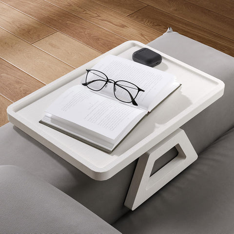Danfoxer bamboo tray with non-slip pads prevents spills on sofa cushions.
