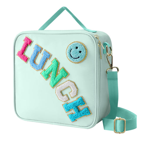 Dark Swan smiley lunchbag in green keeps meals cheerful and ready for school.
