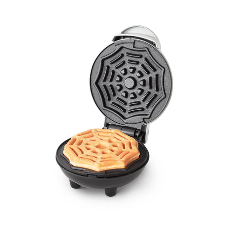 Dash Spiderweb Mini Waffle Maker showcases Halloween-theme design for festive treats.