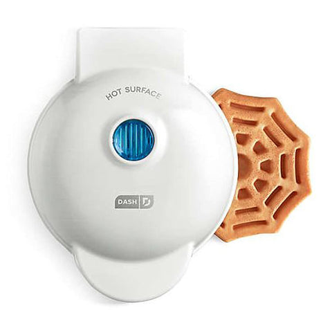 Dash Spiderweb Mini Waffle Maker with spiderweb design creates quick Halloween waffles.