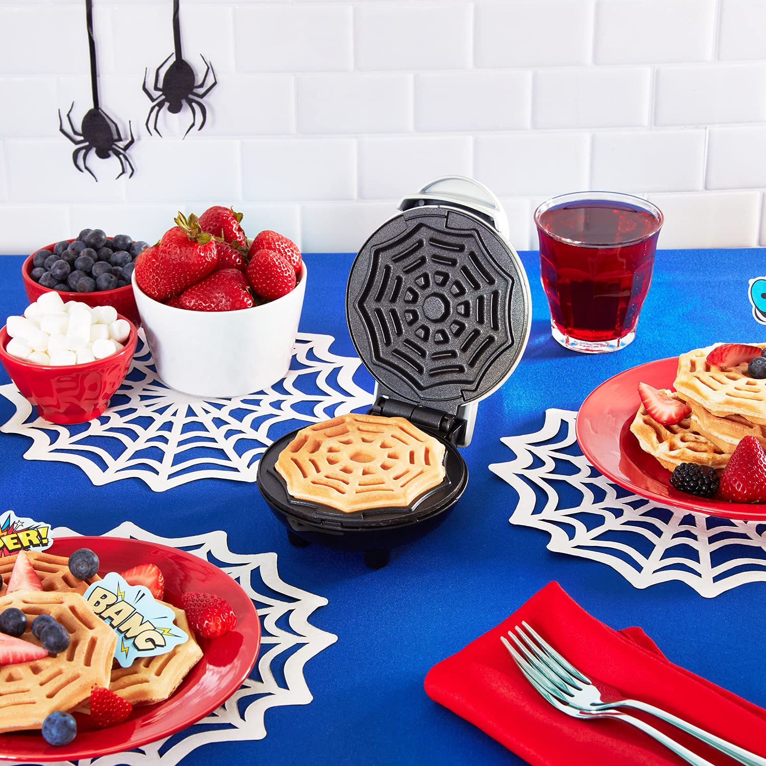 Dash Spiderweb Mini Waffle Maker white shell fits countertops anywhere.