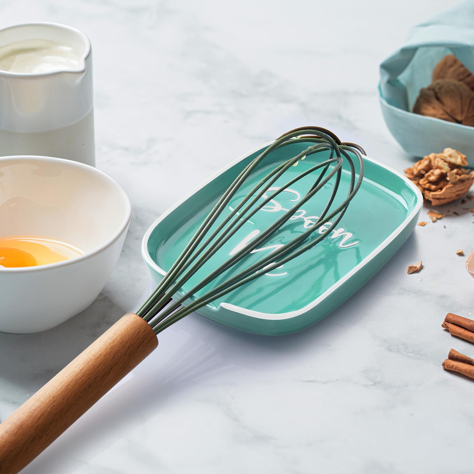 DAYYET dishwasher-safe spoon rest for easy cleaning after cooking.