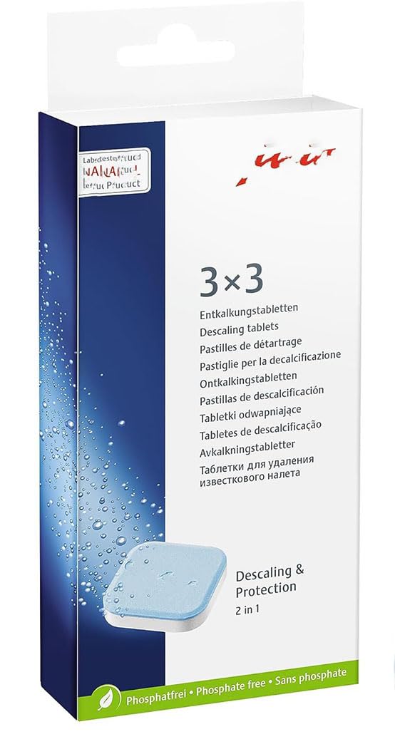 Decalcifying tablets packaging shown beside a coffee machine for easy maintenance and upkeep.