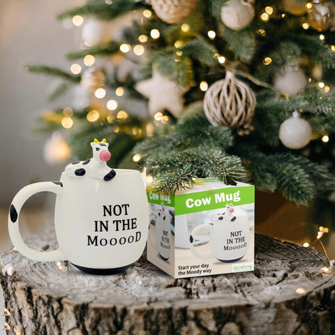 Decodyne white porcelain mug with cow motif, great as a playful office gift.
