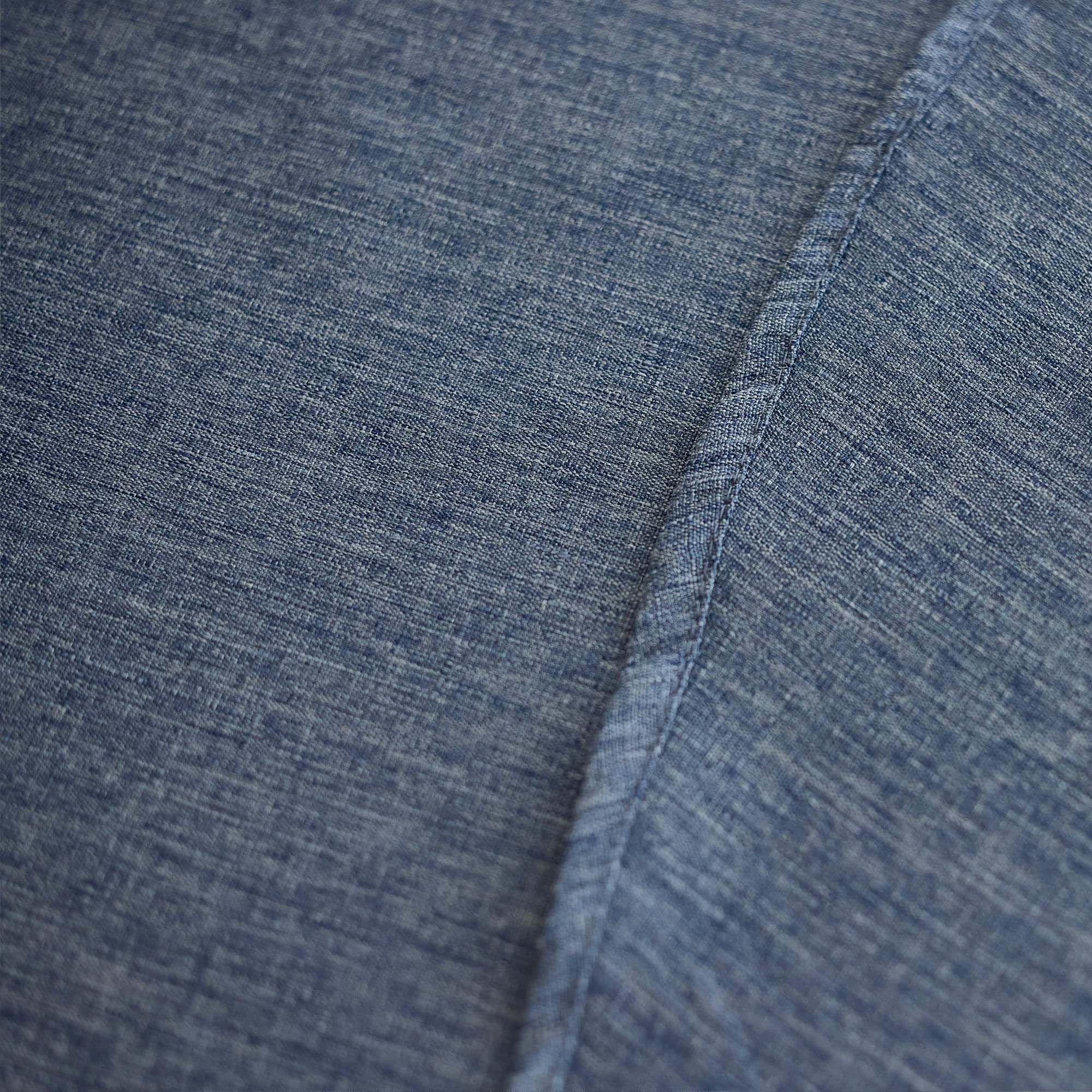 Indoor/outdoor Decorelia tablecloth in denim blue protecting surfaces