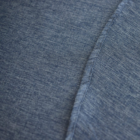 Indoor/outdoor Decorelia tablecloth in denim blue protecting surfaces