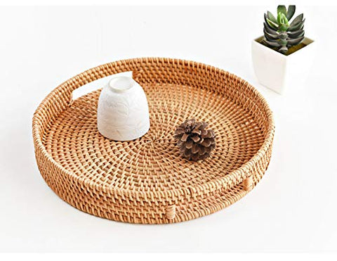 DECRAFTS round rattan serving tray holding keys and mail near entryway.