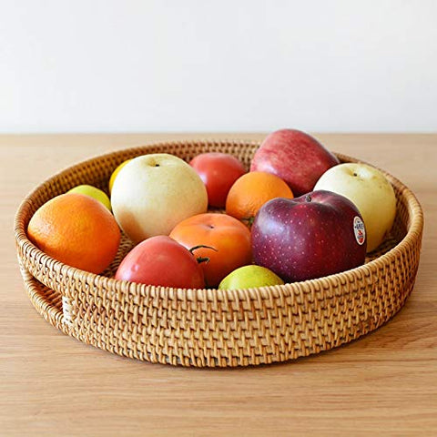 DECRAFTS round rattan serving tray on kitchen island keeps essentials organized.