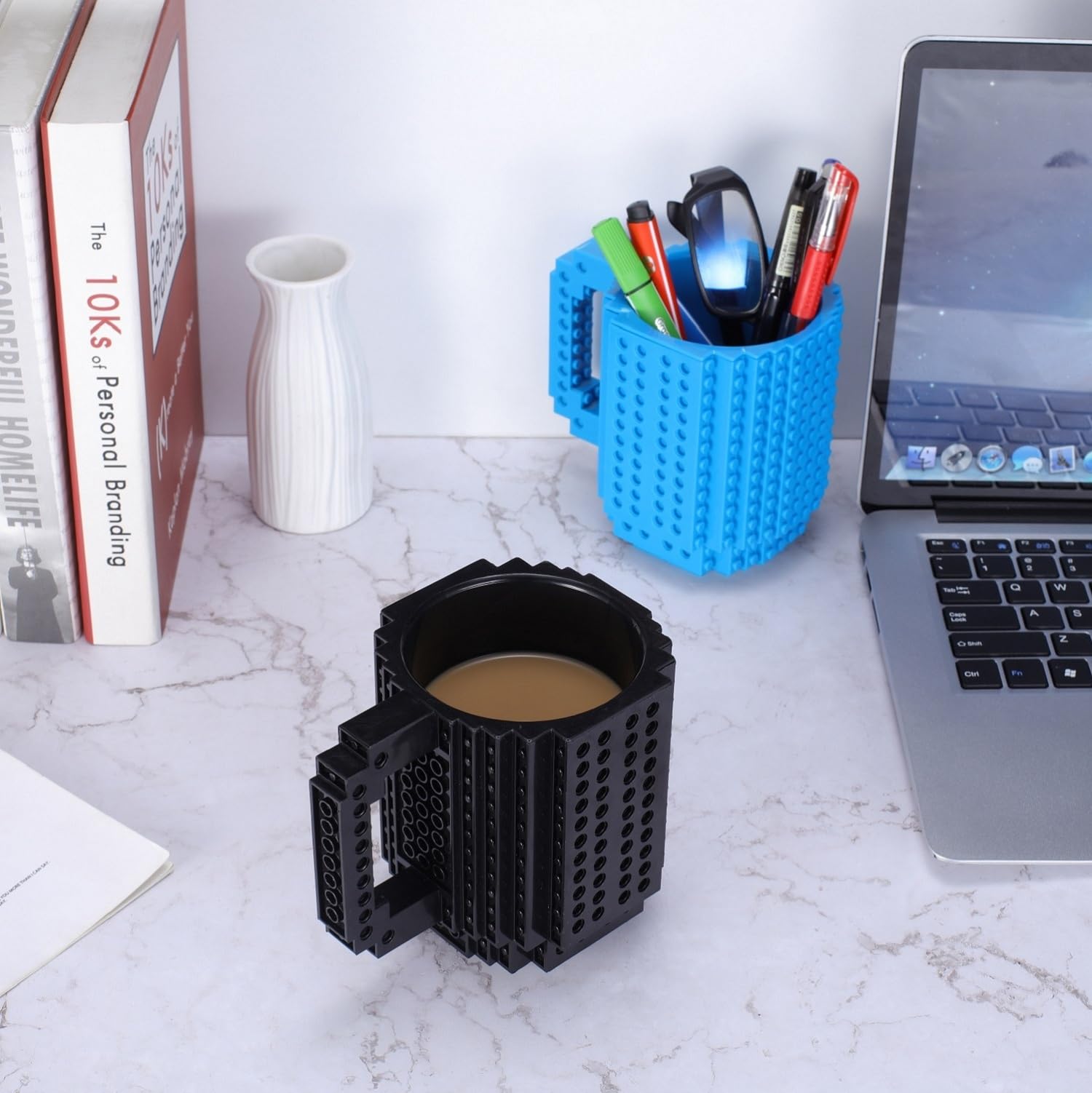 DEEXITO Build-on Brick Mug with removable blocks for creativity.