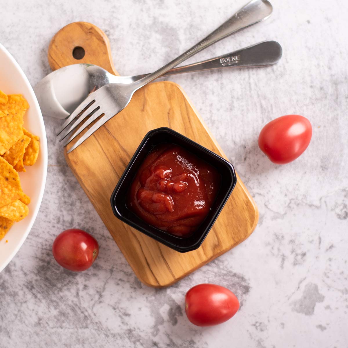 Dellling black porcelain dipping bowls offer durable, easy-care kitchenware