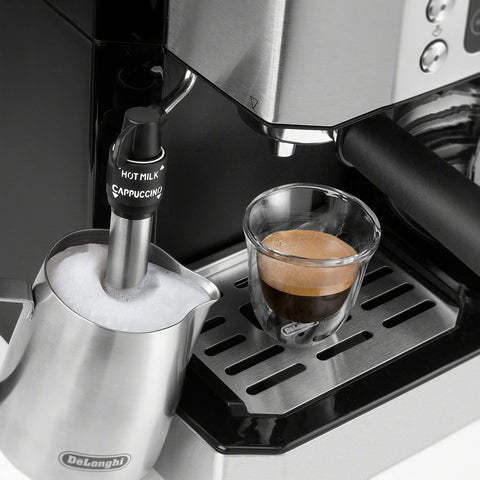 De'Longhi COM532M advanced steam wand creates silky micro-foam for drinks.