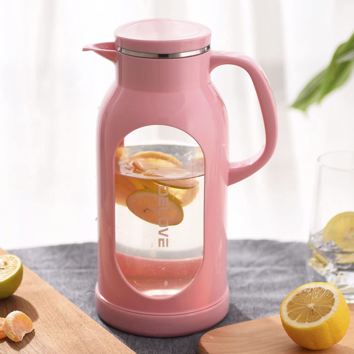 Delove pitcher in use for iced tea or hot tea at a home gathering.