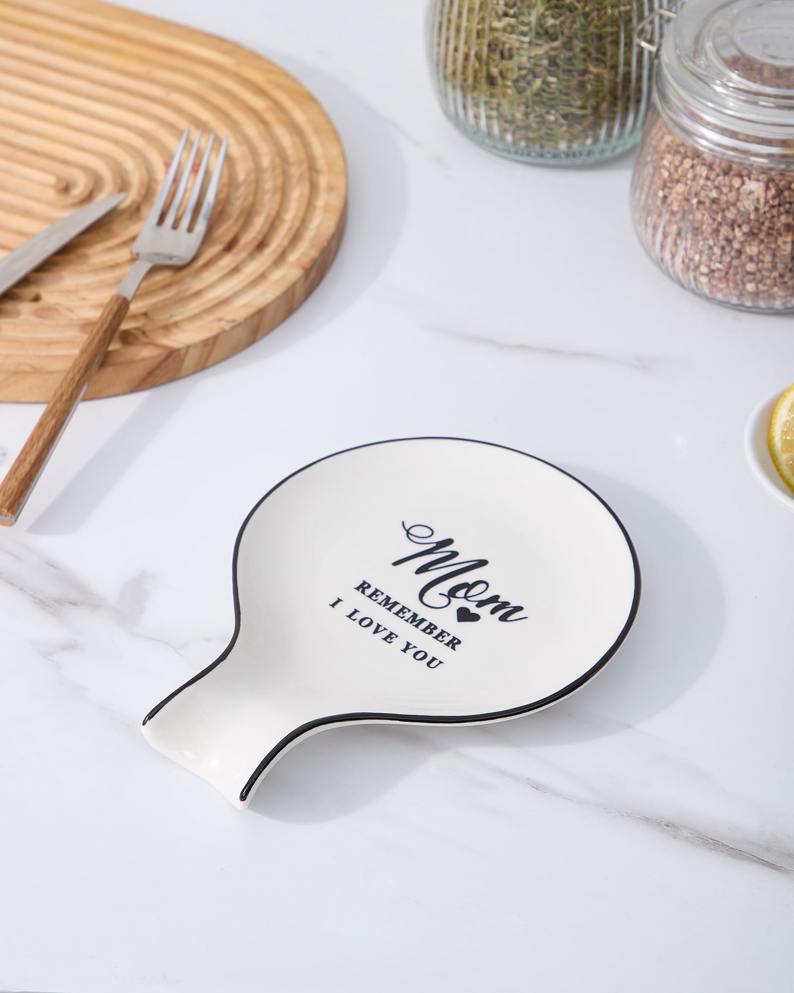 Delpnana large spoon rest accommodates multiple utensils on counter.