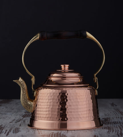 DEMMEX hammered copper teapot surface showing rustic texture.
