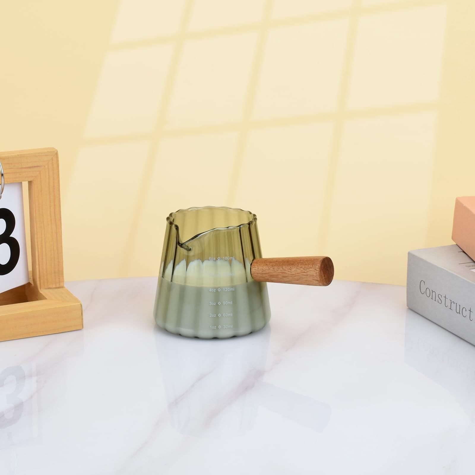 Denovin compact kitchen essential for small spaces and quick pours.