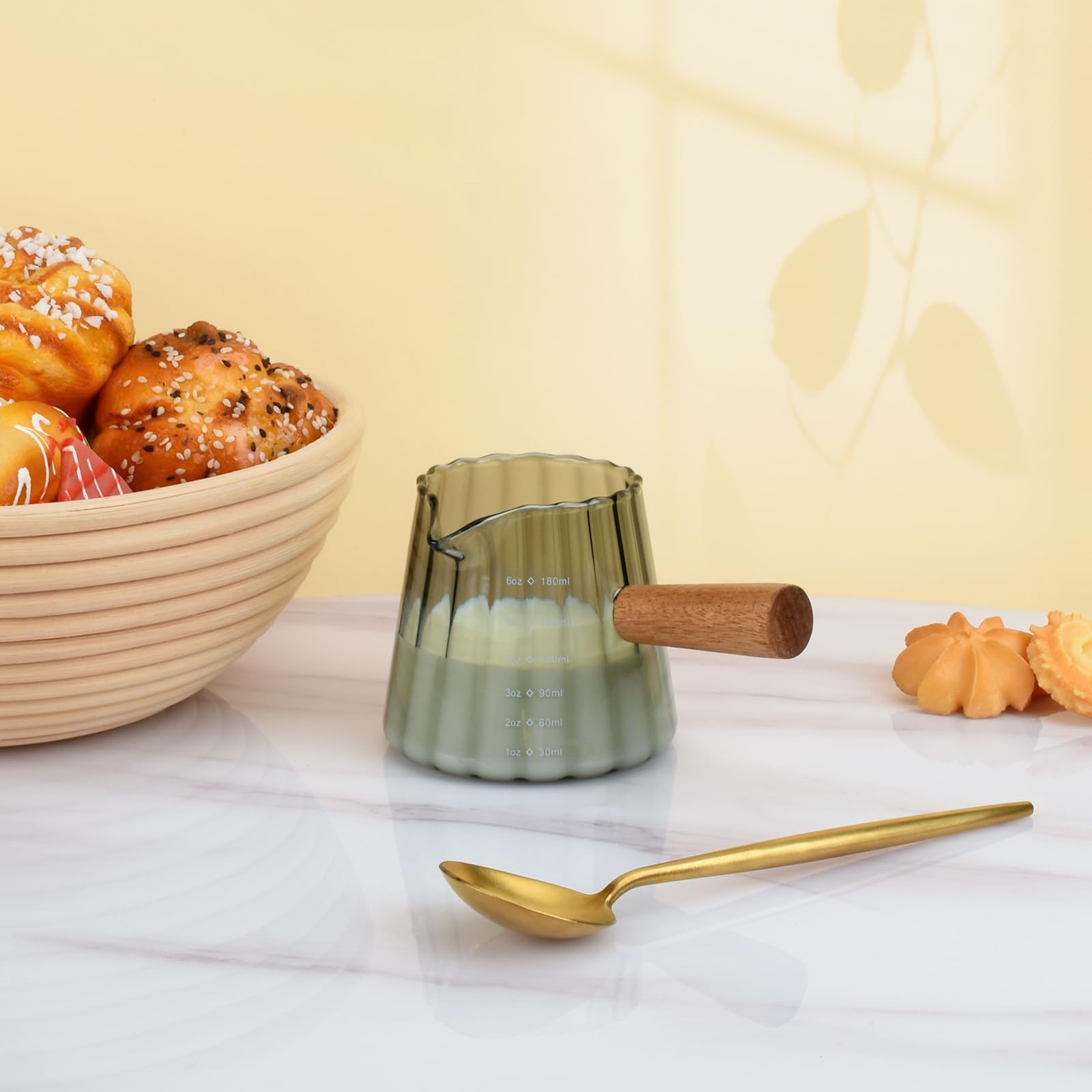 Denovin pour-spout pitcher enables mess-free pouring and portion control.