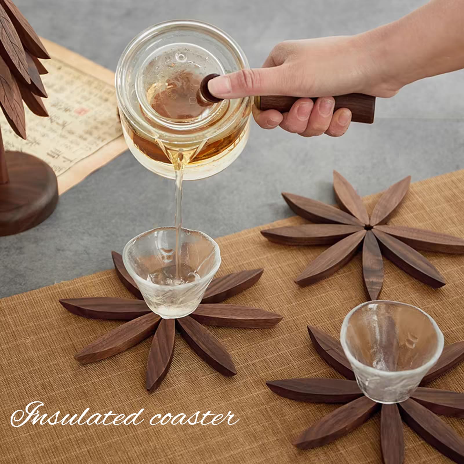 DEOLD Trivet shown on glass, marble, and wood surfaces for heat protection.