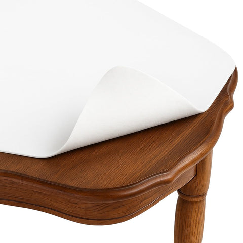 Dependable Essentials cut-to-fit table pad protects surfaces from spills
