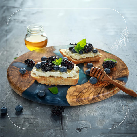 Designium gift-ready olive wood cheese board for weddings, housewarmings, and anniversaries.