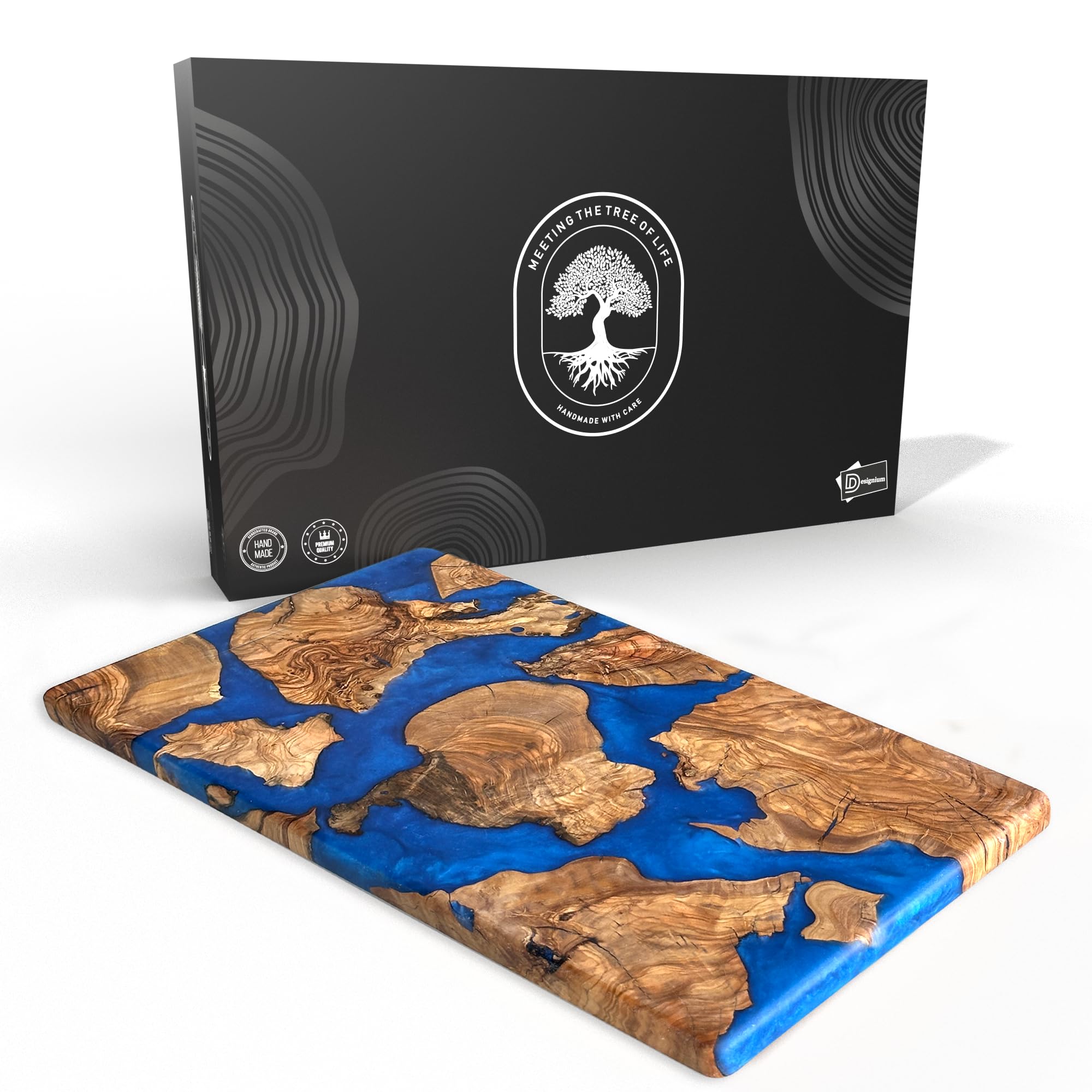 Designium olive wood resin cutting board showing natural grain with blue resin river for stylish serving