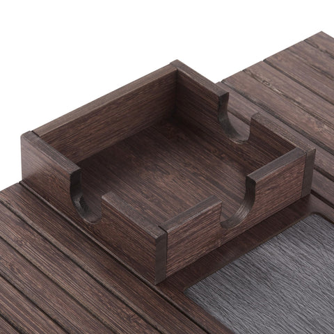 Detor couch tray in use on sofa armrest keeping items steady.