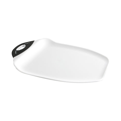 Dexas Chop & Scoop board cutting juicy fruits with a curved edge to contain juices.