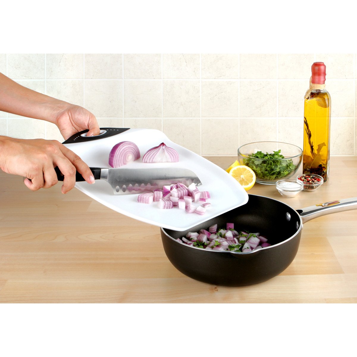 Dexas Chop & Scoop board featuring non-slip feet for stable use during slicing.