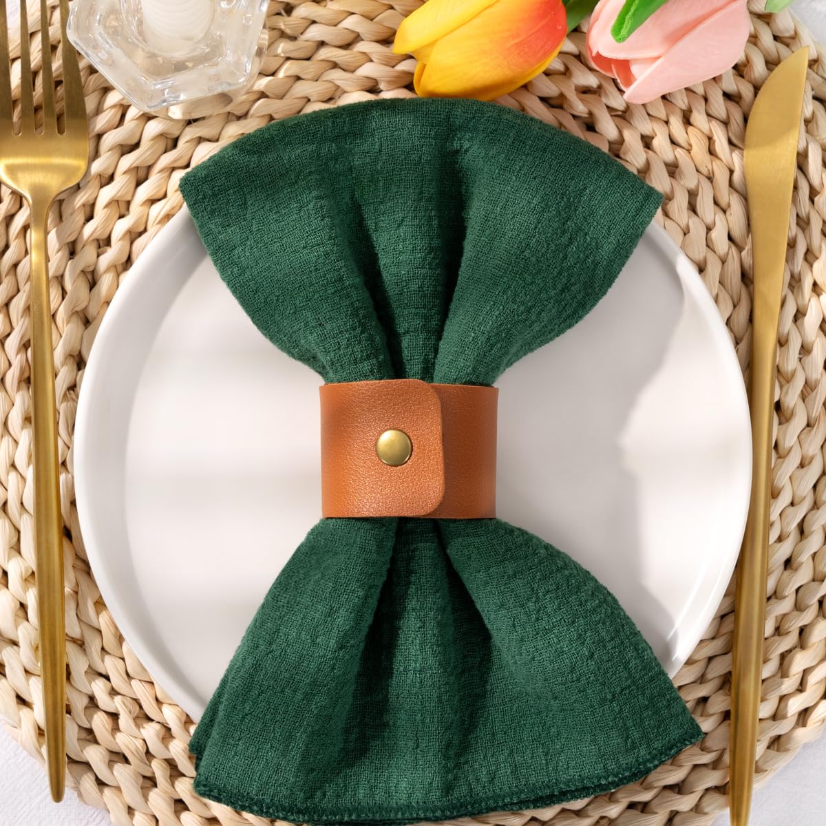 DeZerlor emerald-green napkins showcase decorative folding ideas for decor.