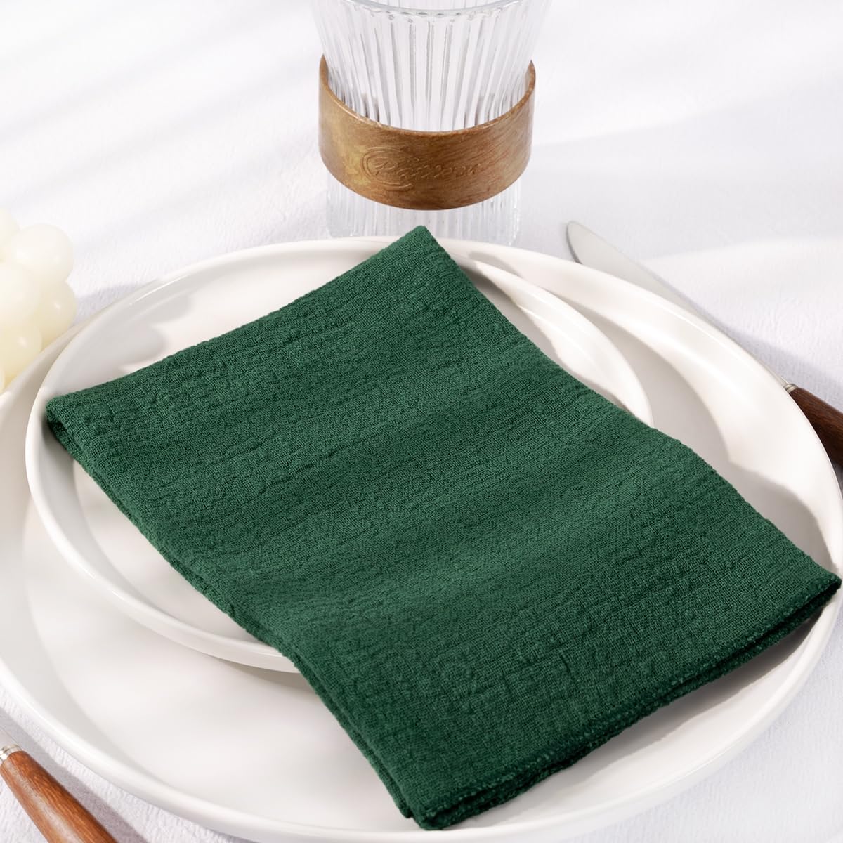 DeZerlor Emerald Green napkins flatlay for elegant Easter table decor.