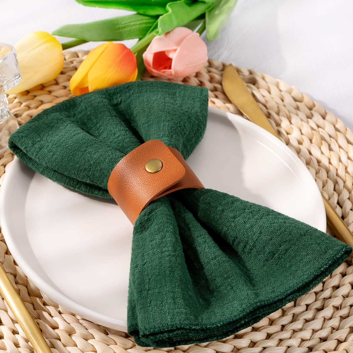 DeZerlor cloth napkins arranged with rings for quick table setup.