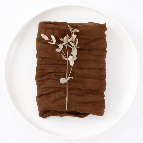 DeZerlor baby shower table with rose-fold napkins.