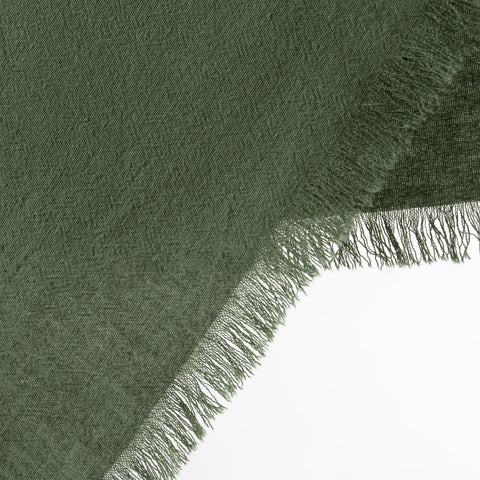 DeZerlor baby shower table setting napkins in soft olive green.