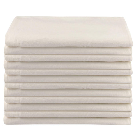 DG Collections flour sack towel drying glass—lint-free shine and streak-free drying.