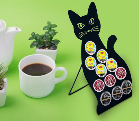 Stainless steel cat pod holder sits on counter for easy access.