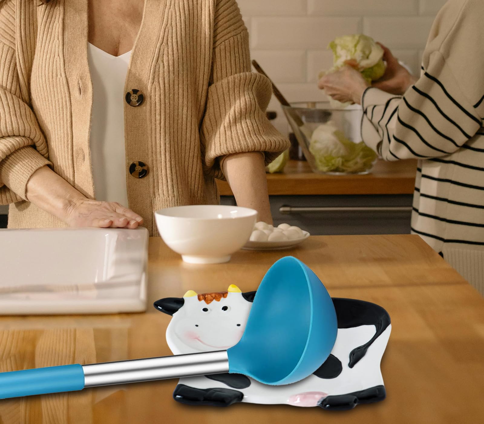 dgudgu Cow Shaped Spoon Rest makes a charming kitchen gift idea.
