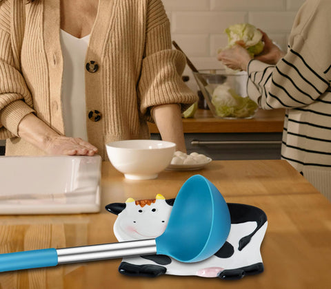 dgudgu Cow Shaped Spoon Rest makes a charming kitchen gift idea.