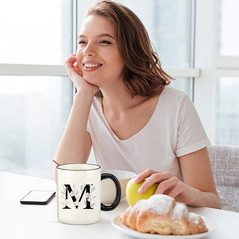 DHQH monogram mug closeup highlighting the 26-letter design.