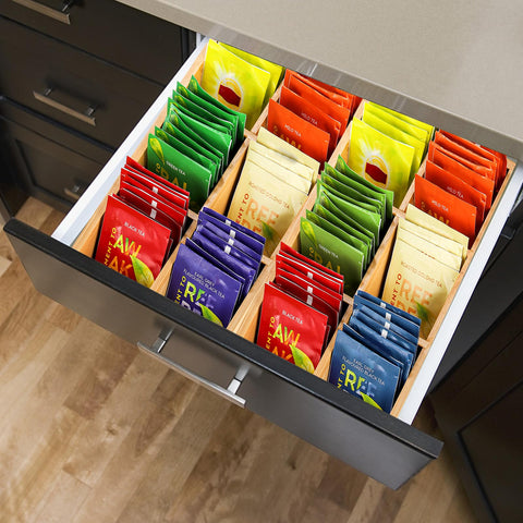 Dicunoy kitchen counter organizer in wood keeps tea, sugar, and accessories orderly.