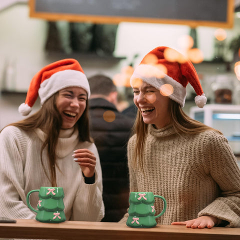 Didaey pink bow Christmas tree mug, a thoughtful winter gift for women.