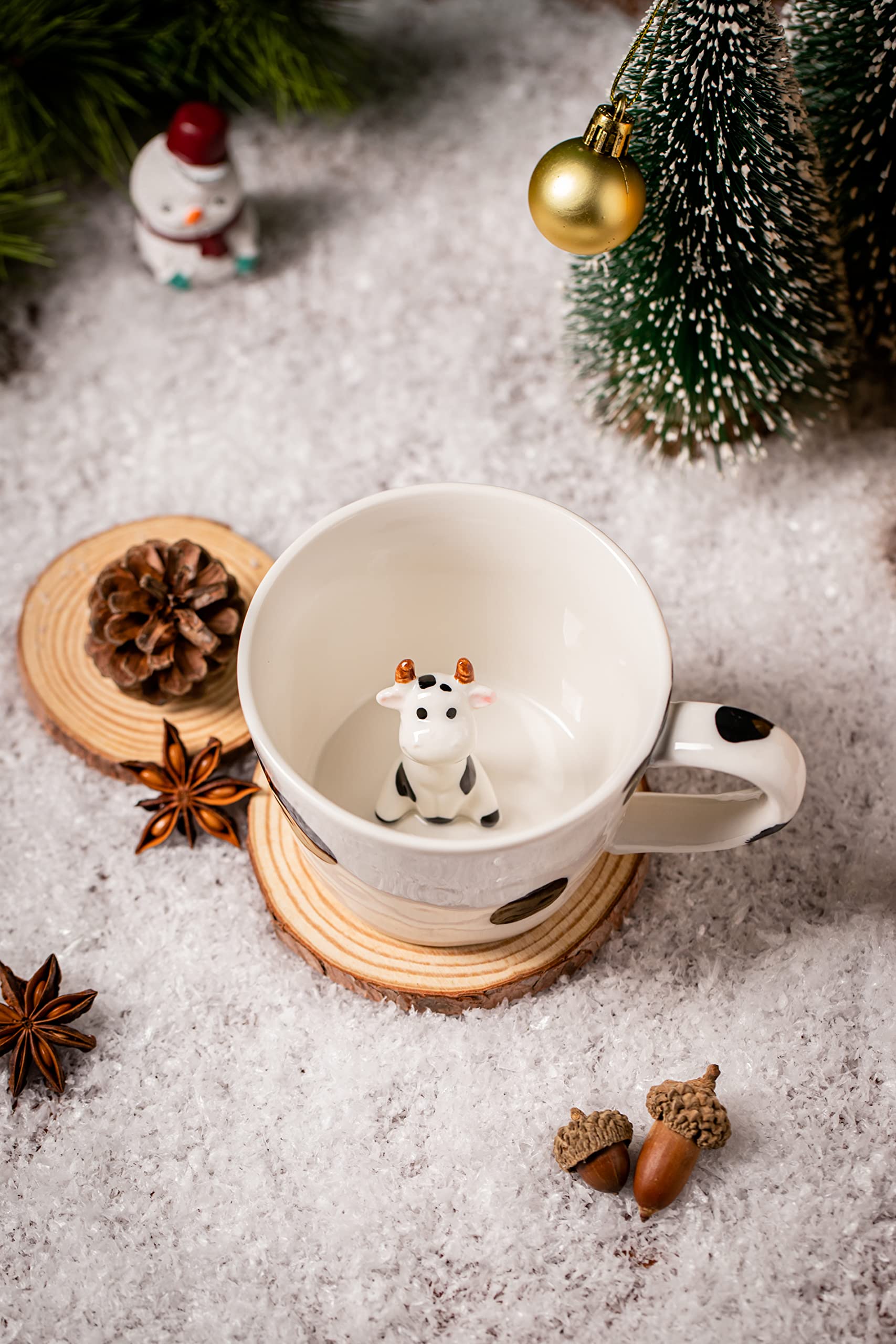 DIHOclub mug shows bottom reveal cow as you sip tea.