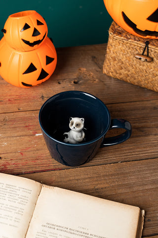 DIHOclub Racoon mug hidden bottom reveal as you sip.
