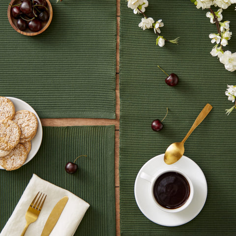 DII placemats pair with napkins and runners for coordinated decor.
