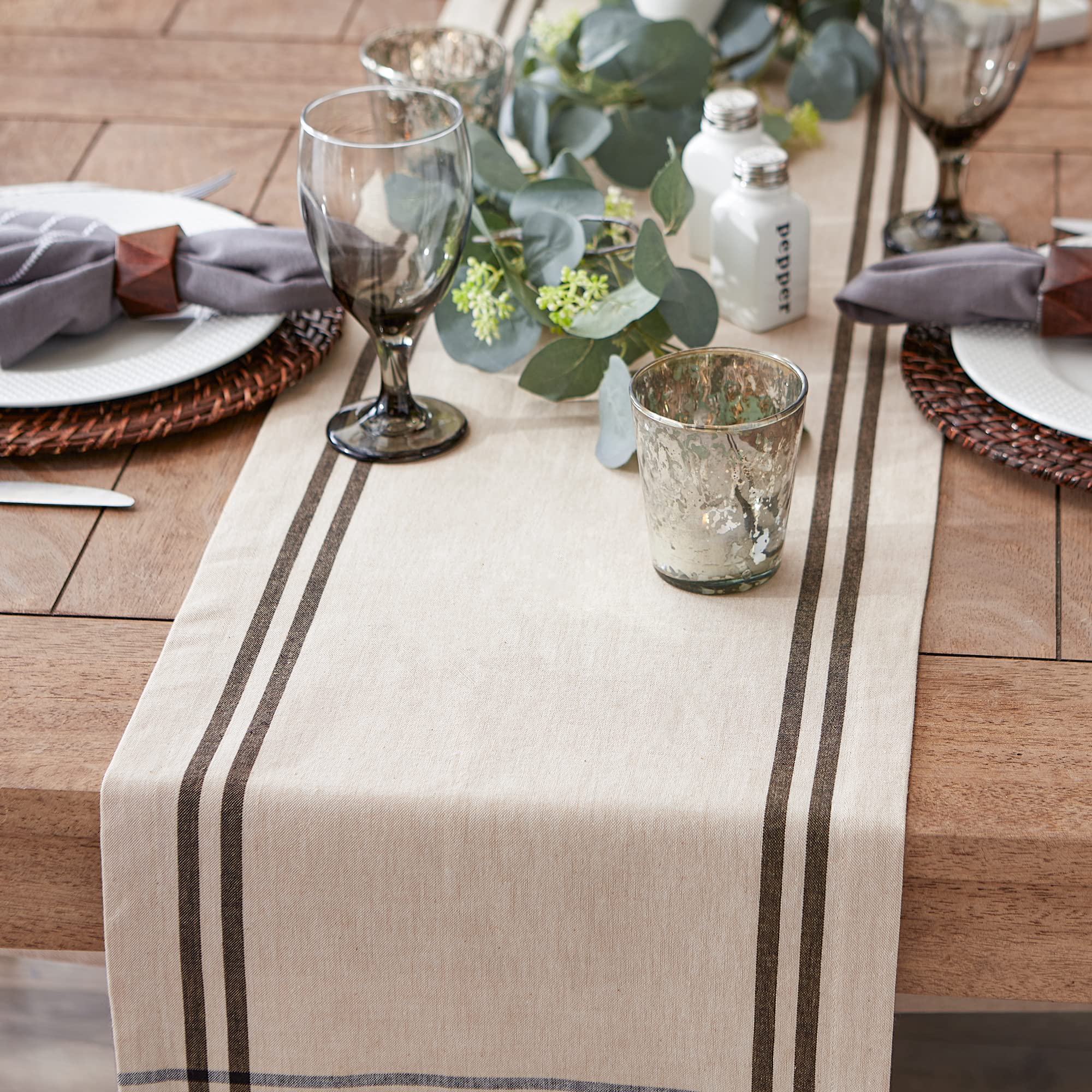 Mitered corners add refined geometry to the table setting.
