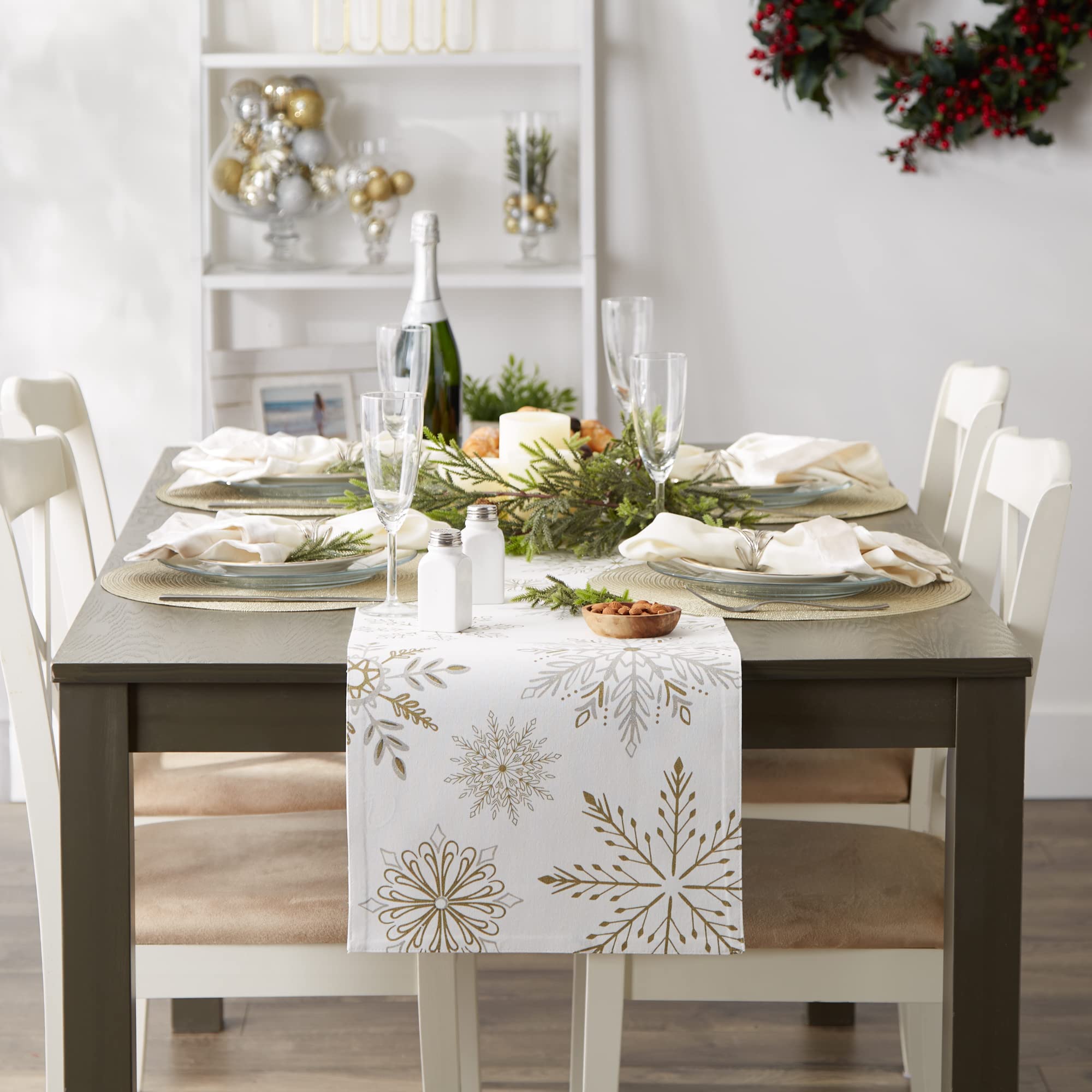 DII ready-to-serve table setting featuring shimmering runner.